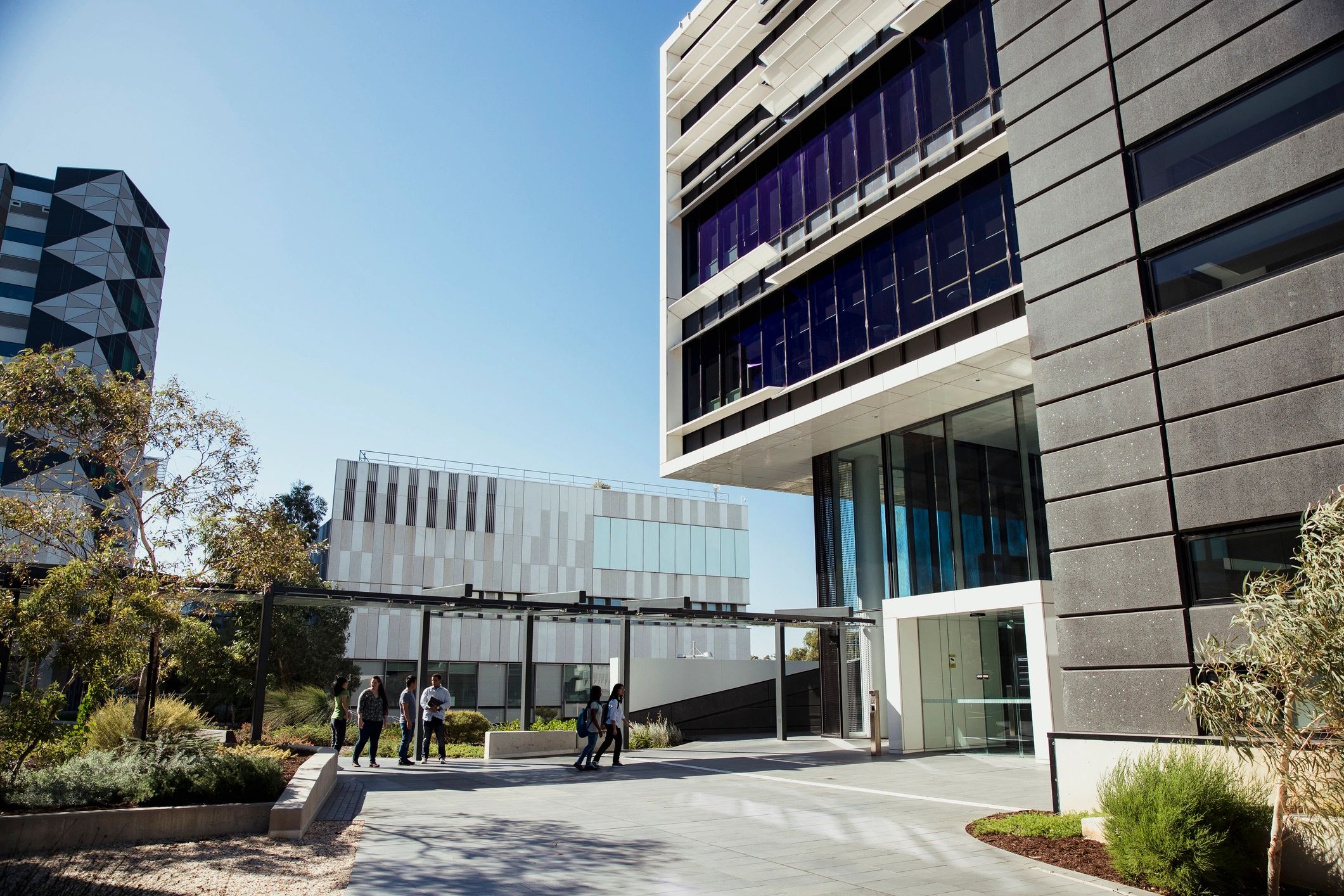 Students walking across a campus