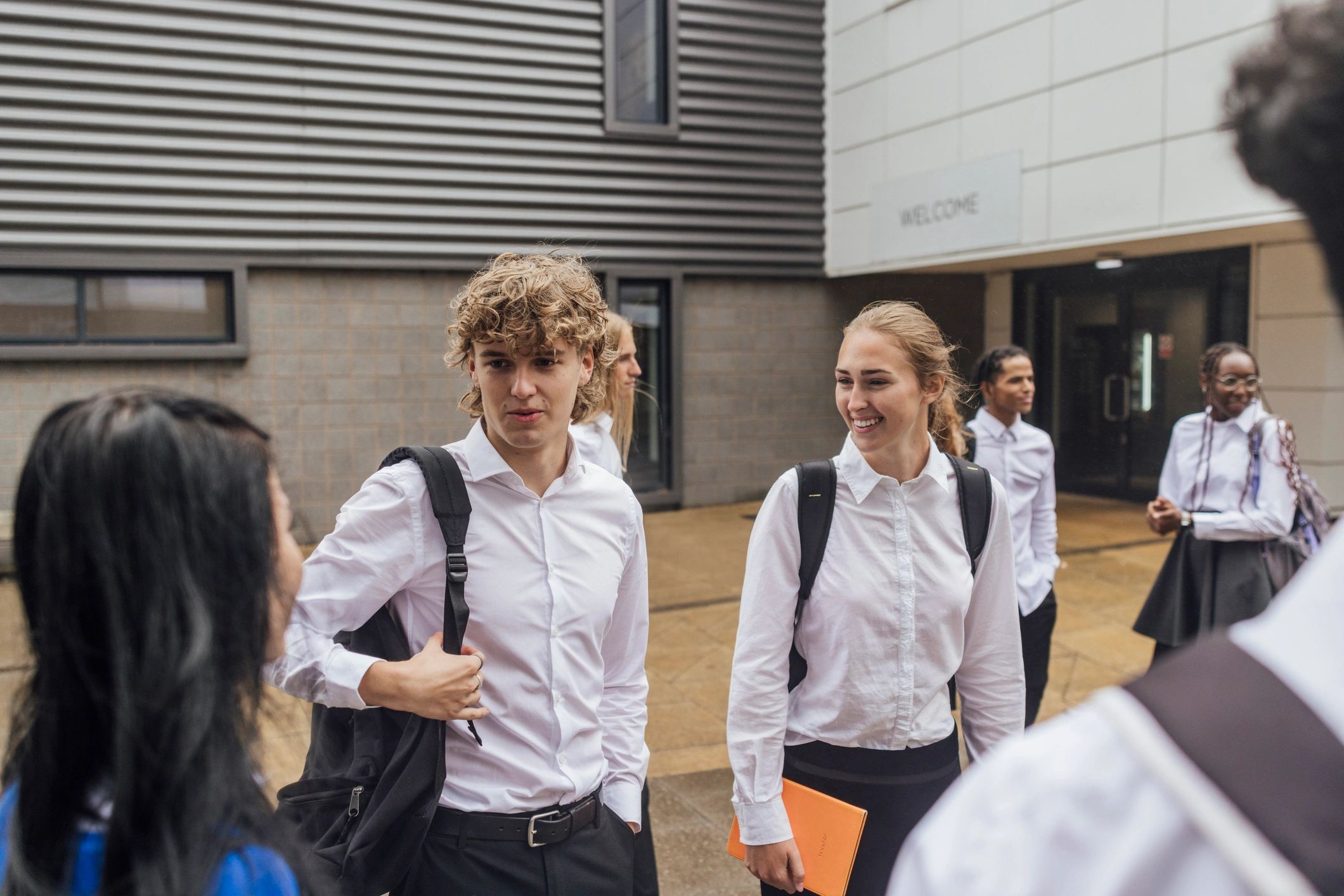 Students gathered outside a private faith-based school campus
